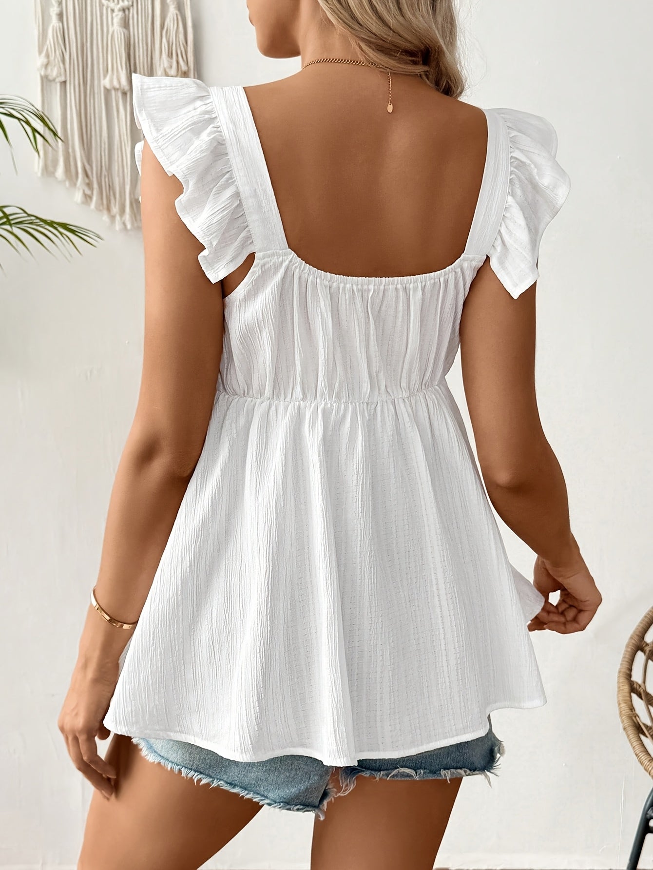 Effortless White Textured Babydoll Top for Women with Sweetheart Neckline Ruffle Sleeve Flowy Maternity Style