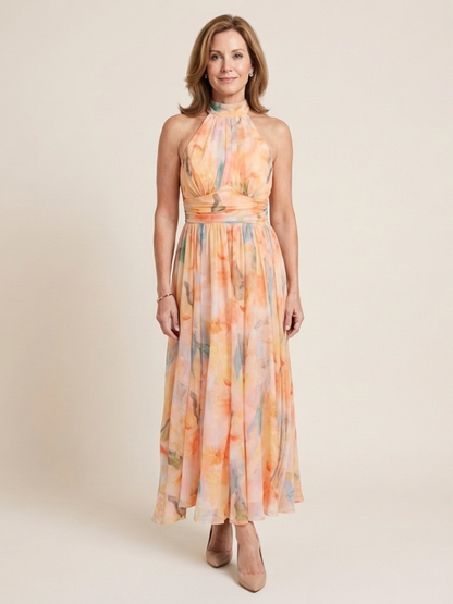 Elegant Peach Watercolor Floral Autumn Wedding Guest Dress for Women with Halter Neck Ruched Waist Flowing Maxi Style