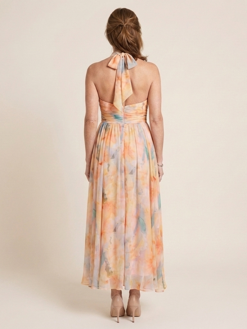 Elegant Peach Watercolor Floral Autumn Wedding Guest Dress for Women with Halter Neck Ruched Waist Flowing Maxi Style