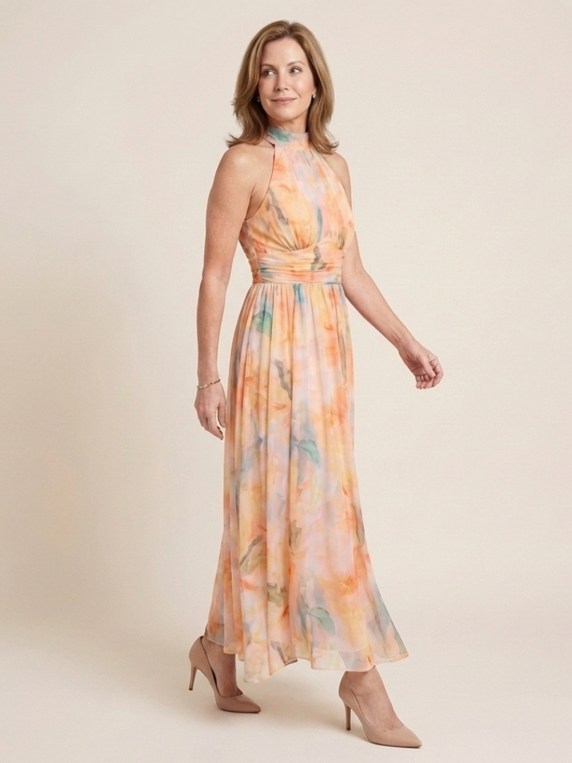 Elegant Peach Watercolor Floral Autumn Wedding Guest Dress for Women with Halter Neck Ruched Waist Flowing Maxi Style