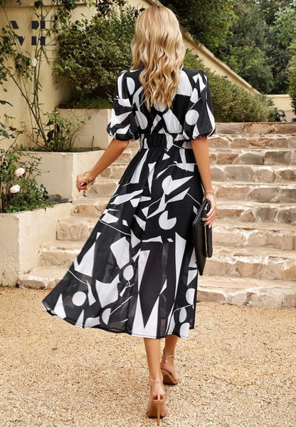 Effortless Floral Midi Dress for Women with V Neck Puff Sleeve Shirred Waist Flowing Style