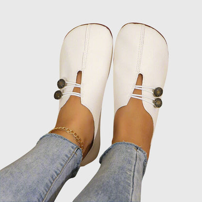 Effortless Distressed Leather Flat Loafer for Women with V Cut Vamp Elastic Strap Button Detail Casual Style