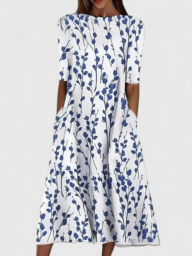 Effortless Floral Midi Dress for Women with Round Neck Elbow Sleeve Pocket Flowing Casual Style
