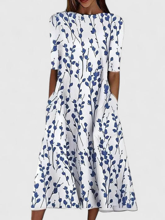 Effortless Floral Midi Dress for Women with Round Neck Elbow Sleeve Pocket Flowing Casual Style
