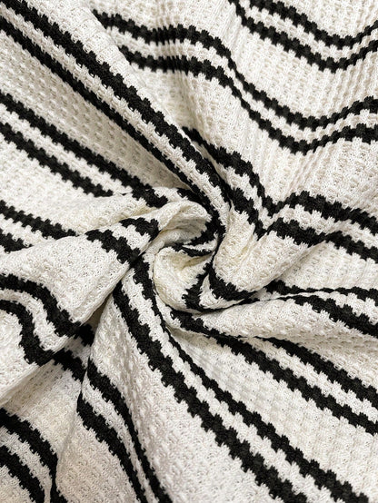 Effortless Black and White Striped Knit Romper for Women with Scoop Neck Spaghetti Strap Button Front Tie Waist Casual Style