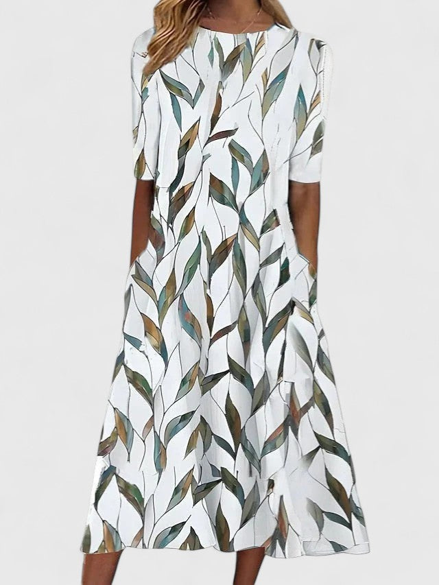 Effortless Floral Midi Dress for Women with Round Neck Elbow Sleeve Pocket Flowing Casual Style