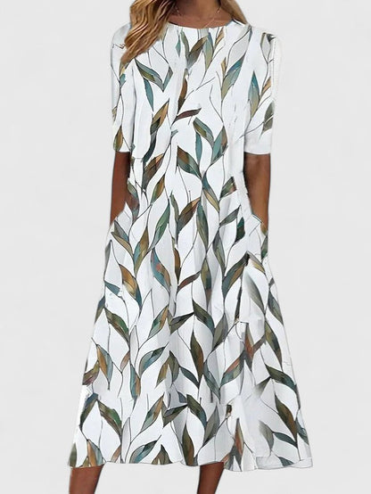 Effortless Floral Midi Dress for Women with Round Neck Elbow Sleeve Pocket Flowing Casual Style