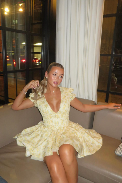 Elegant Yellow Floral Mini Dress for Women with V Neck Puff Sleeve Corset Flowing Style
