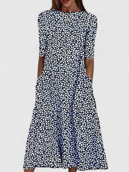 Effortless Floral Midi Dress for Women with Round Neck Elbow Sleeve Pocket Flowing Casual Style